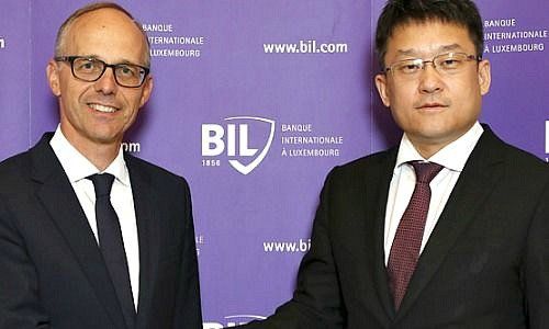 Luc Frieden, BIL and Li Peng, Legend Holdings (L to R)