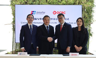 Jian Jiangtao and Wang Lixin (Larry), both UnionPay; Sunny Quek, OCBC, and Carine Low, UnionPay (Image: OCBC)