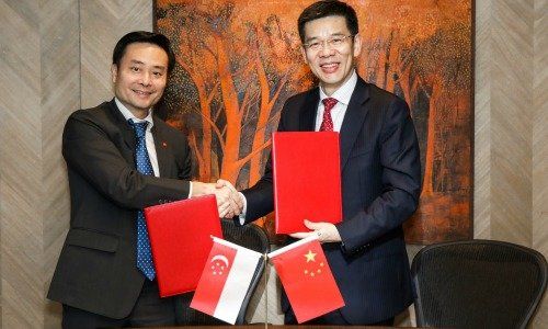 DBS SG Country Head Shee Tse Koon and Sinosure Vice President Huang Zhiqiang
