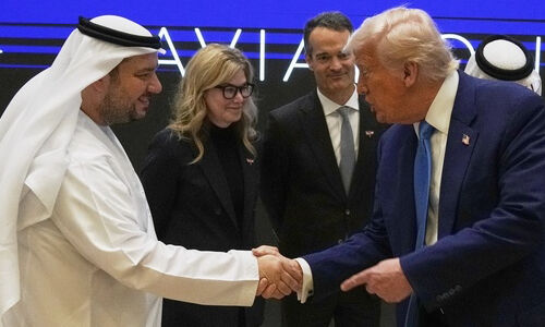 Trump at a business meeting in Abu Dhabi (Image: Keystone)