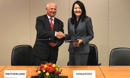 Swiss Ambassador Thomas Kupfer and Jacqueline Loh, Deputy Managing Director MAS