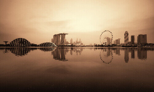 Singapore skyline with urban buildings over water (Image: Shutterstock)