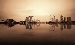 Singapore skyline with urban buildings over water (Image: Shutterstock)