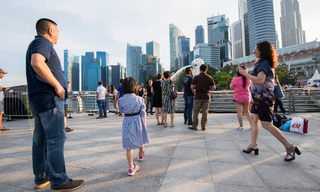 Singapore’s affluent investors are increasingly looking beyond their home market for investment opportunities, while gaps in retirement and succession planning persist. (Image: Shutterstock)