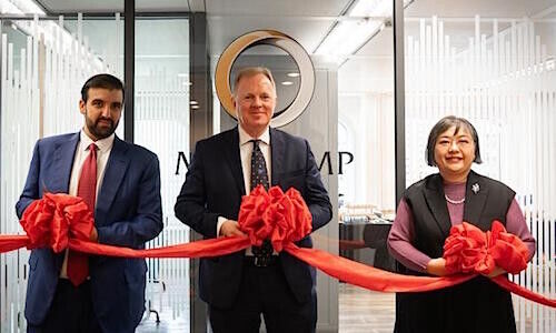 MKS PAMP CEO James Emmett (center) at a recent ribbon cutting ceremony for the Hong Kong office (Image: MKS PAMP)